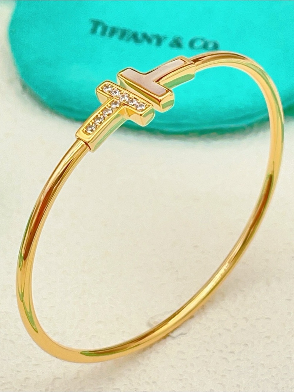 Tiffany & Co. Gold-Tone T-Embellished Bangle with Diamond Accents